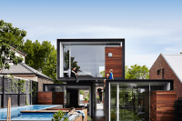 stacked-volumes-house-with-moving-walls-and-raised-pool-4