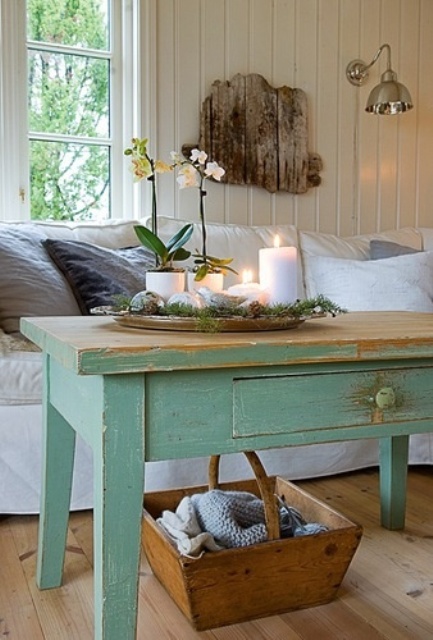 a coffee table with a wooden box under it for storage is a cool and simple idea to implement