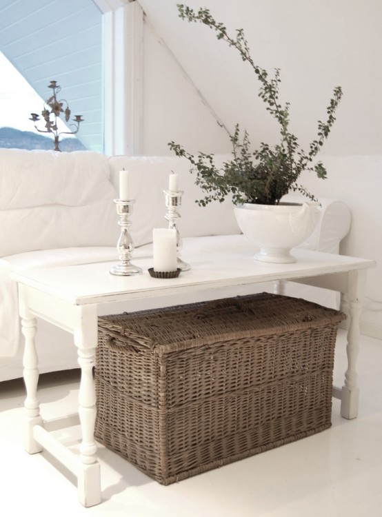 place a large woven box under the table to use it for closed storage comfortably