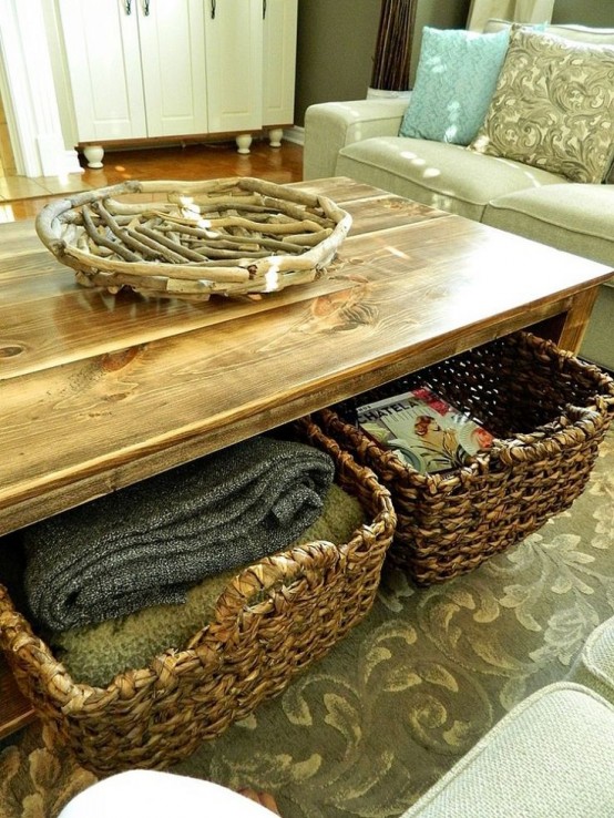 a wooden coffee table with a niche inside and basket drawers to store everything you may want
