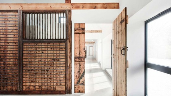 Striking Stable Conversion With Old Wooden Beams Left