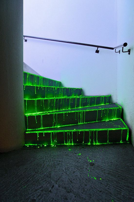 neon green drips covering the whole staircase and glowing in the dark will make your home bolder and scarier