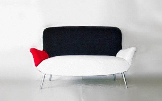 a catchy black, white and red loveseat is a catchy piece due to its color scheme, it will make a statement and will catch an eye