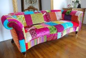 a bright patchwork sofa made of colorful pieces and with a refined vintage design is a stylish idea for a bright and eclectic space