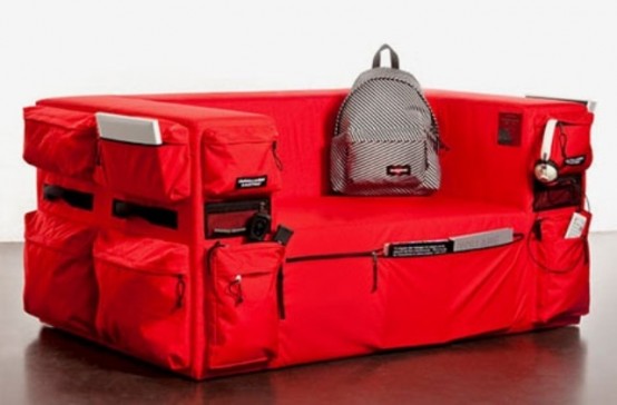 a red sport clothes style sofa with lots of zip pockets around to store various stuff is a catchy and lovely idea for a modern space