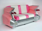 a pink and white sofa styled as part of a retro car is a creative and bold idea that will make a statement