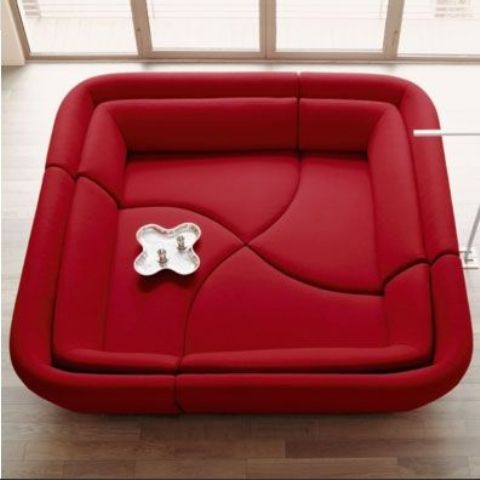 a red box composed of four parts is a creative and bold sofa that can make a fantastic statement in your space with its color and design