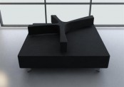 a low black loveseat with a catchy back shaped as a piece of leaf is a unique idea for a modern space
