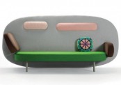 a unique oval sofa reminding of some food and desserts is a lovely and bright idea for a modern space, it will add a touch of fun