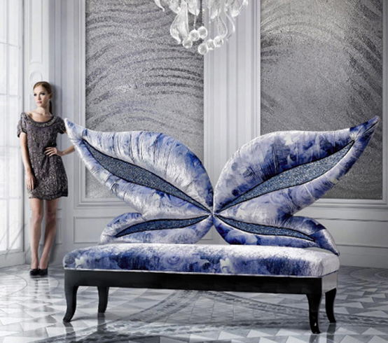 a uniquely shaped indigo blue and white tie-dye sofa with a whimsical back is a gorgeous solution for a modern space