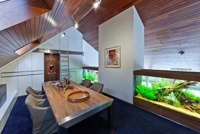 Stylish And Dramatic Apartment With A Big Aquarium