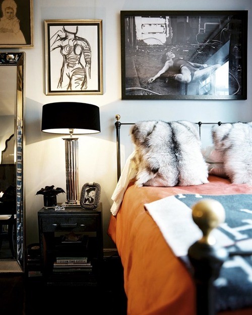 Black and orange is interesting color choice while fur is a good material for masculine decor.
