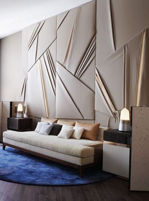 upholstered draped soundprooofing panels are a chic decor feature for such an elegant space