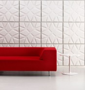 white acoustic panels add a pattern to the space while soundproofing it