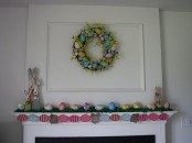 a colorful egg garland, bright fake eggs, a pastel egg wreath and bunny figurines