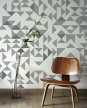a cool geo accent wall in greys is a lovely idea for a modern space, it will give an interesting touch to the space