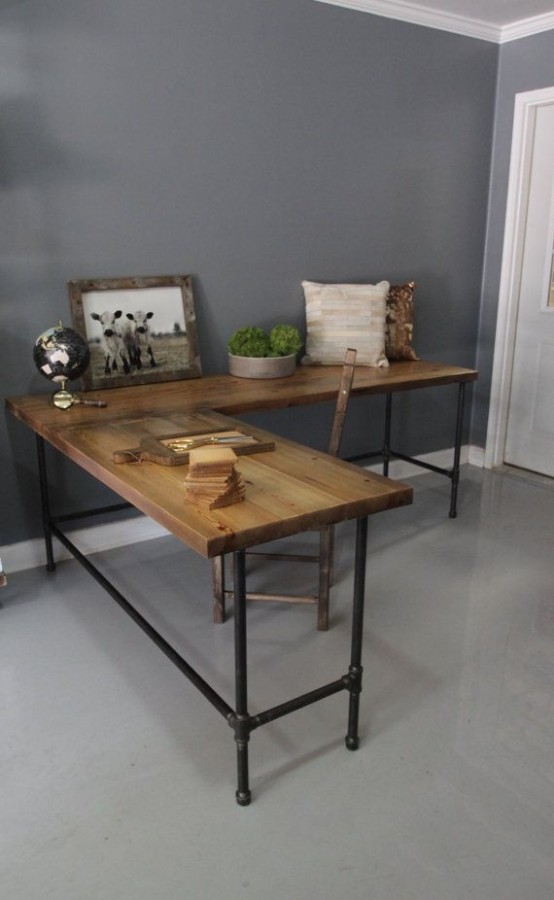 a corner industrial desk like this one features a lot of work space and can be DIYed if you are ready to work a bit