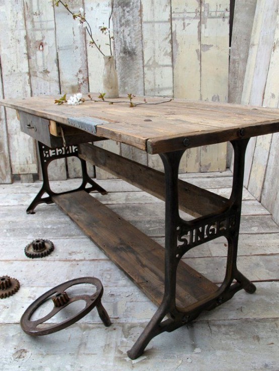 a vintage industrial desk composed of reclaimed wood and metal is a gorgeous solution for a refined vintage space