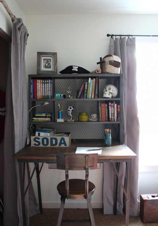an industrial desk with a storage unit right on it, with metal legs and a stained wooden desktop is a practical idea for many home offices and not only