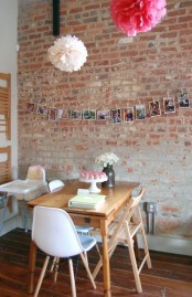 an old brick wall makes your dining space catchy, interesting and bold at the same time