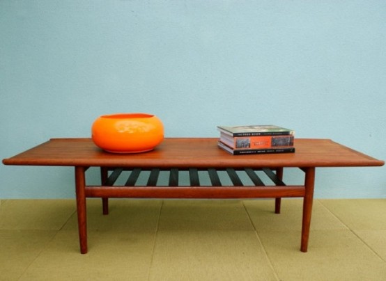 a rich-stained tall coffee table with an open storage compartment under the tabletop is a stylish solution for a mid-century modern space