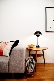 a mid-century modern side table – a rich-stained two tiered piece is a functional and cool solution for a modern interior