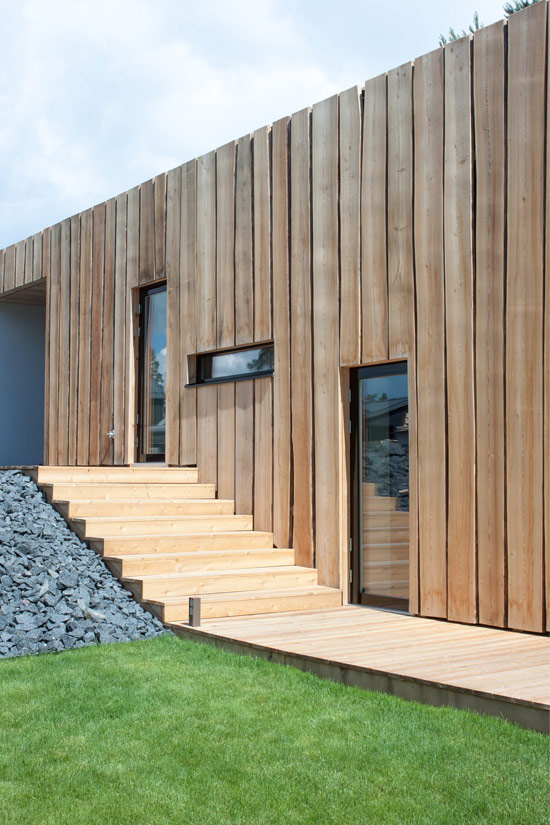 Stylish Minimalist House With Predominant Black In Design