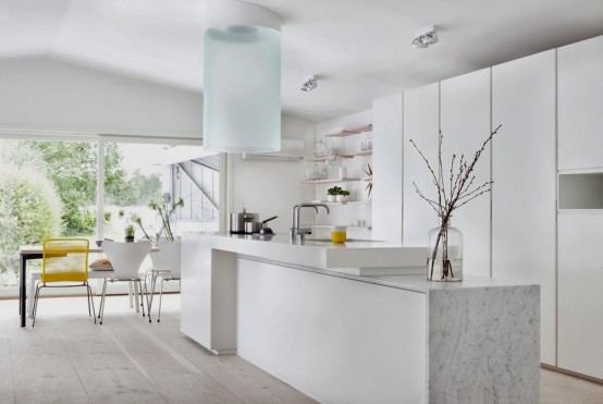 Stylish Minimalist Kitchen With Bright Yellow Accents