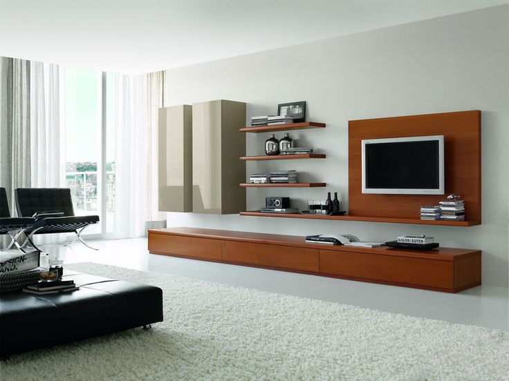 a rich stained wooden TV unit, floating shelves and grey sleek wall mounted storage units for a modern space