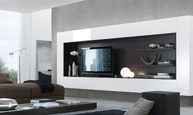 a cool black and white wall mounted storage unit with closed compartments and open shelves looks bold and contrasting