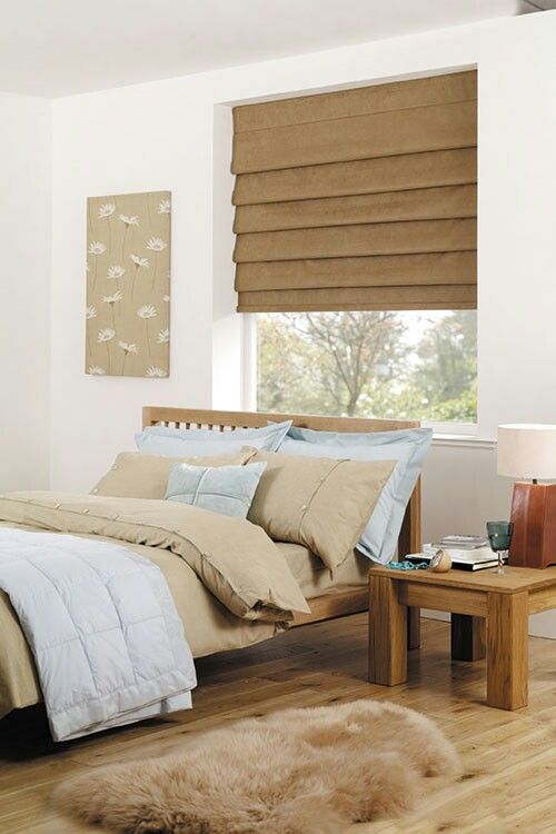 a burlap Roman shade is a cool and cozy idea to add a warm rustic feel to the space