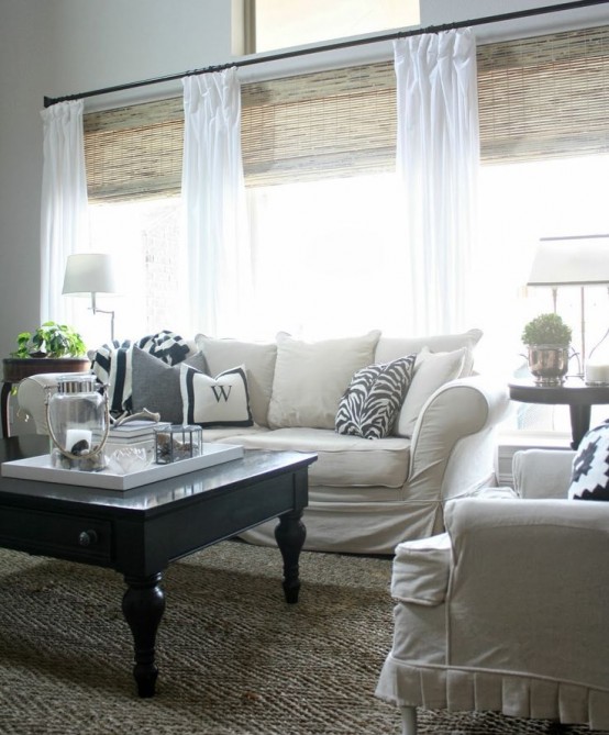 woven Roman shades paired with white curtains - only curtains feature not so much light blocking, and shades help with that