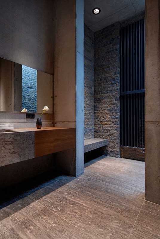 If you like ruggedness then exposed stone is a way to go. For a more contemporary look use tiles imitating it.