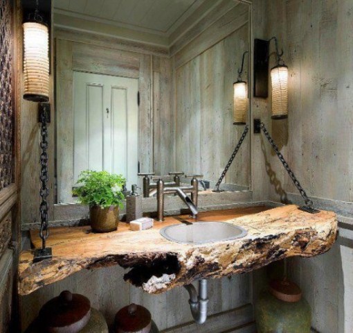 Industrial elements makes any room more masculine. Wood slab with a sink hanging on the wall definitely makes a statement here.