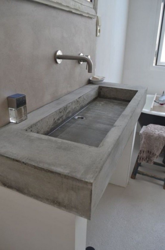 a floating concrete vanity wiht a sink will save a lot of space and will make your bathroom look more contemporary