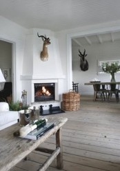 Summer House Decorated With Rough Wooden Furniture