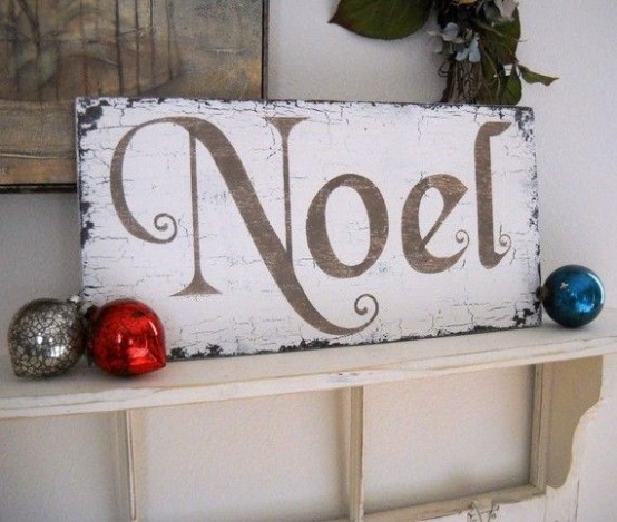 a simple vintage Christmas sign with a single word can be easily DIYed by you to make any space or nook feel holiday-like