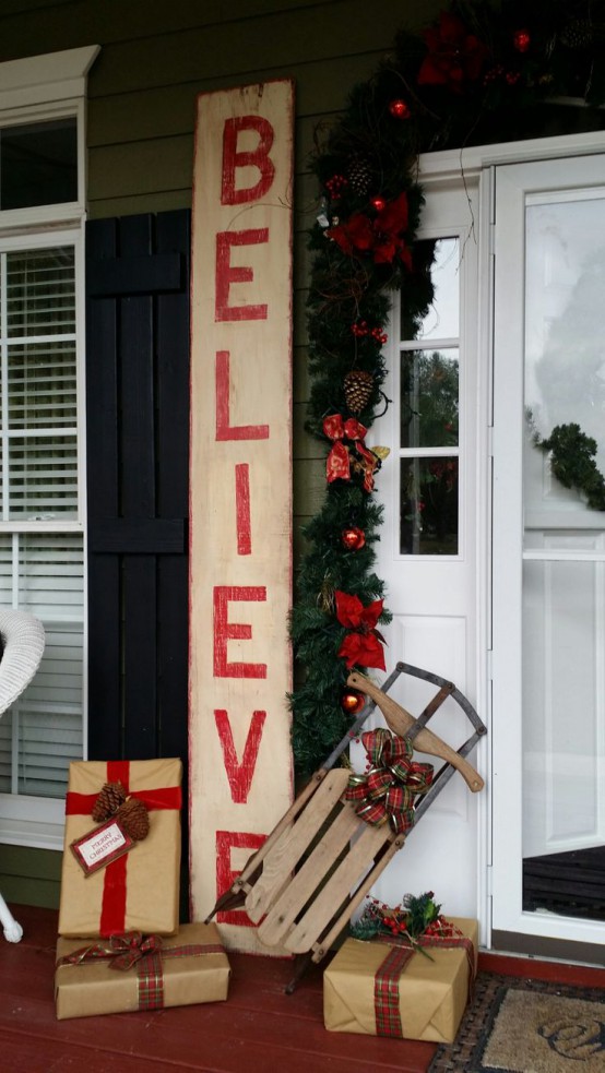 a rustic red and white wooden plaque Christmas sign like this one is very easy to DIY and can be used for rustic outdoor decor