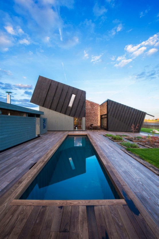 Sustainable Home Design With Solar Panels And Collectors