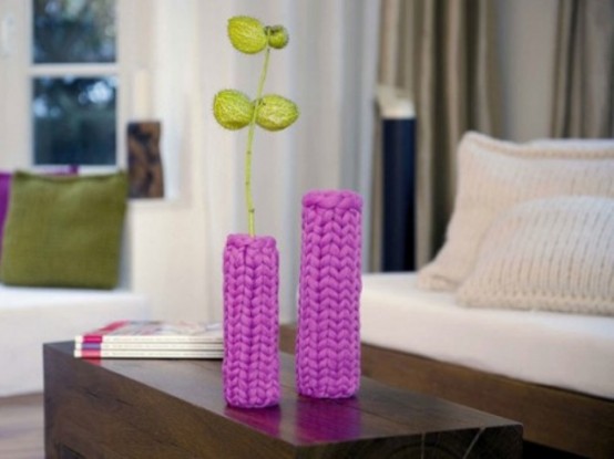 usual vases covered with bold purple chunky cozies look very nice, colorful and bold and add interest and coziness to the space