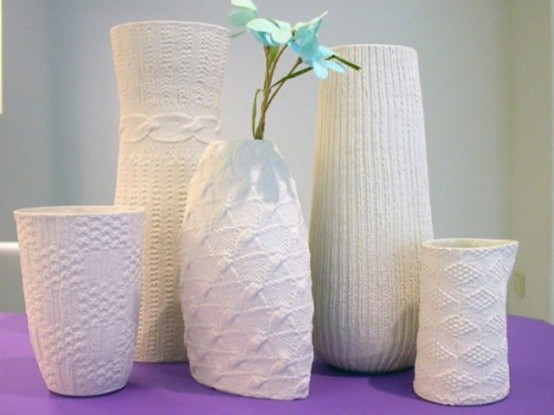 vases with sweater patterns or with cozies covering them will give a lovely and welcoming feel to the space and make it cooler