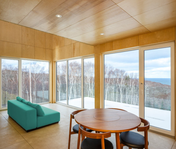 Tall And Narrow Wooden Cabin House In Nova Scotia Wonderful views are a part of every corner of this home, and nature around can be seen from every spot