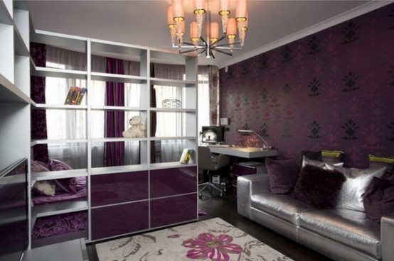 a dark purple and silver teen bedroom, a printed purple wall, a mirror sliding door wardrobe, a floral rug and a retro chandelier