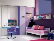 a bright teen girl’s room done in bold berry shades like violet, purple and fuchsia, with touches of white, with modern built-in furniture and space-saving solutions