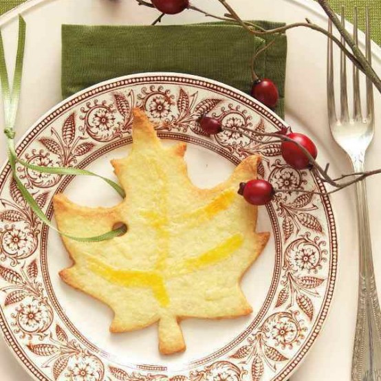 a pretty maple-leaf shaped cookie with a ribbon is a great idea to mark each place setting and to give it as a party favor at the same time