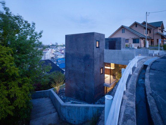Modern Three Storey Concrete House Below Street Level - DigsDigs