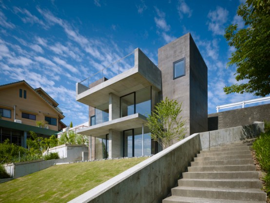 Modern Three Storey Concrete House Below Street Level - DigsDigs