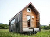 Tiny Mobile Shelter With Rustic Charm