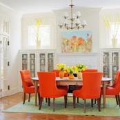 Traditional Dining Room With Orange Color Pop
