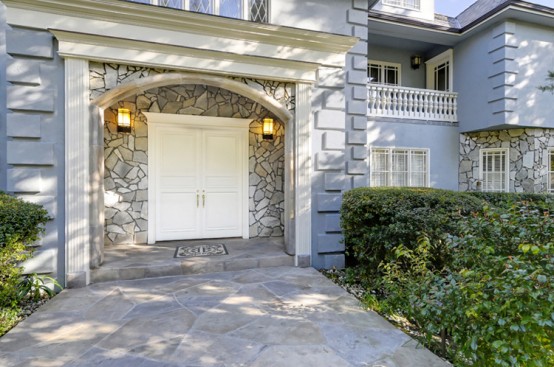 Traditional House With Ivy Covered Walls